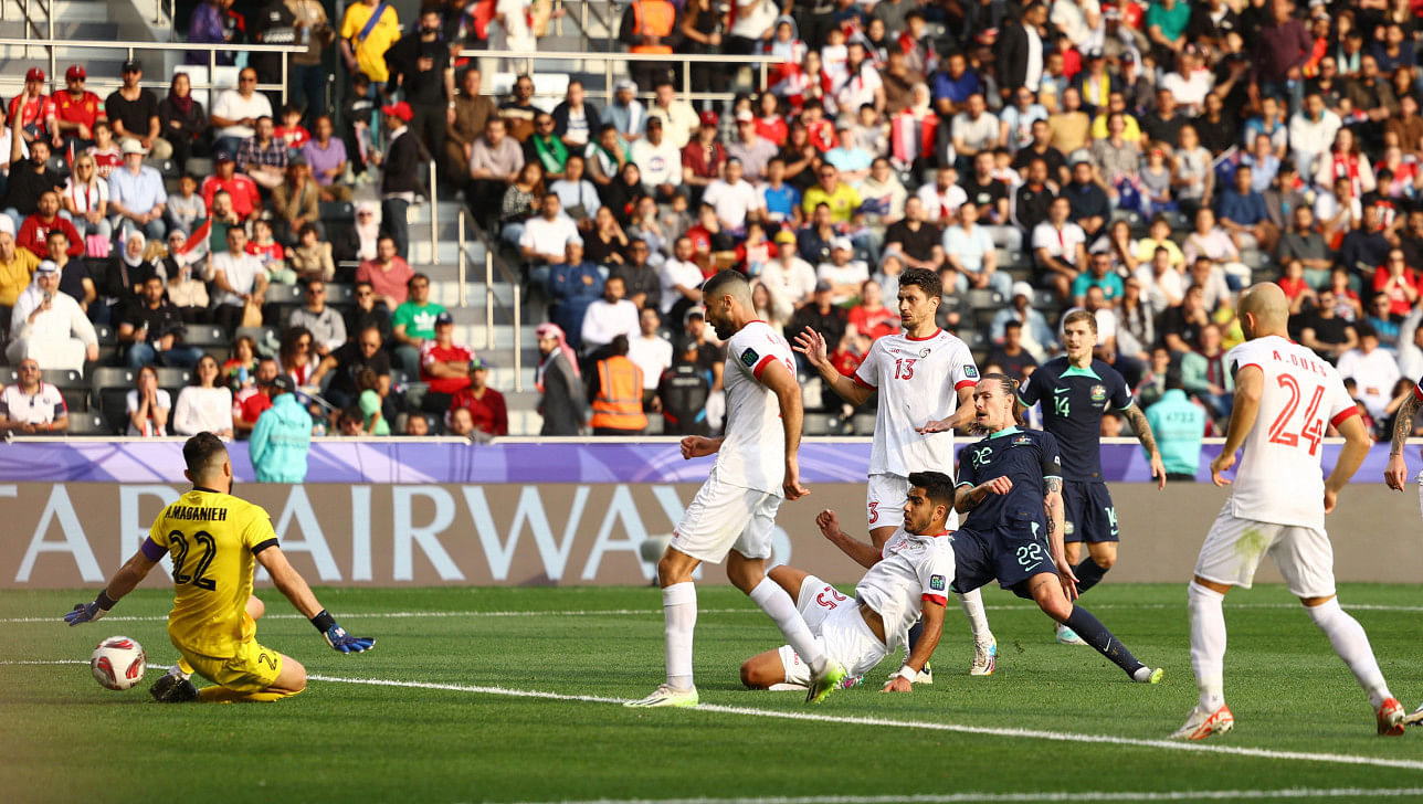 Australia edge syria 1-0 to reach asian cup knockouts0