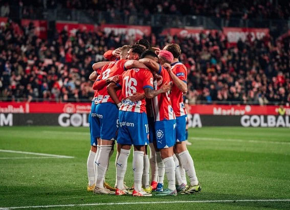 Rampant girona keep liga lead, madrid and barca triumph0