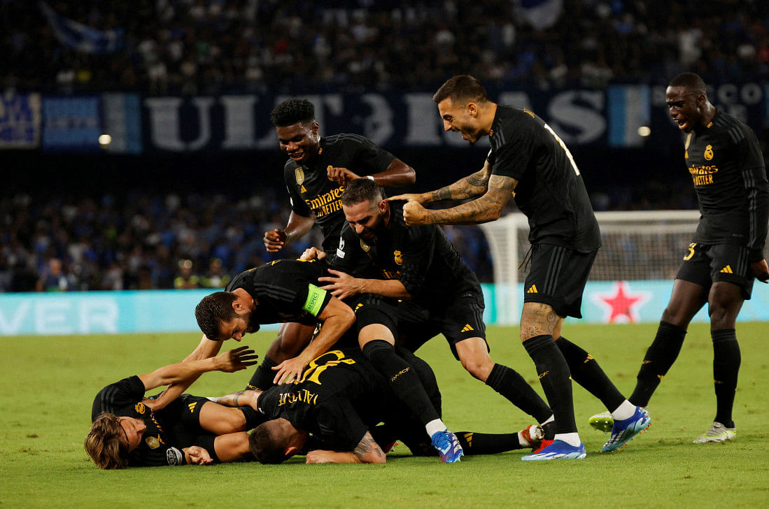 Real fight back to win five-goal thriller at napoli 1 Real fight back to win five-goal thriller at napoli0