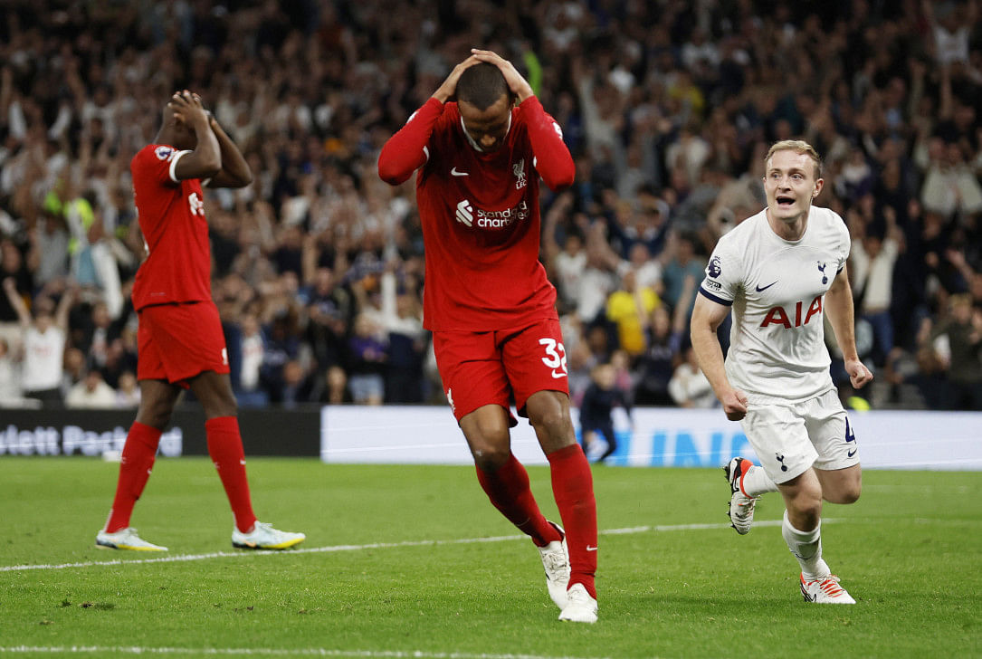 Spurs sink nine-man liverpool thanks to last-gasp matip own goal0