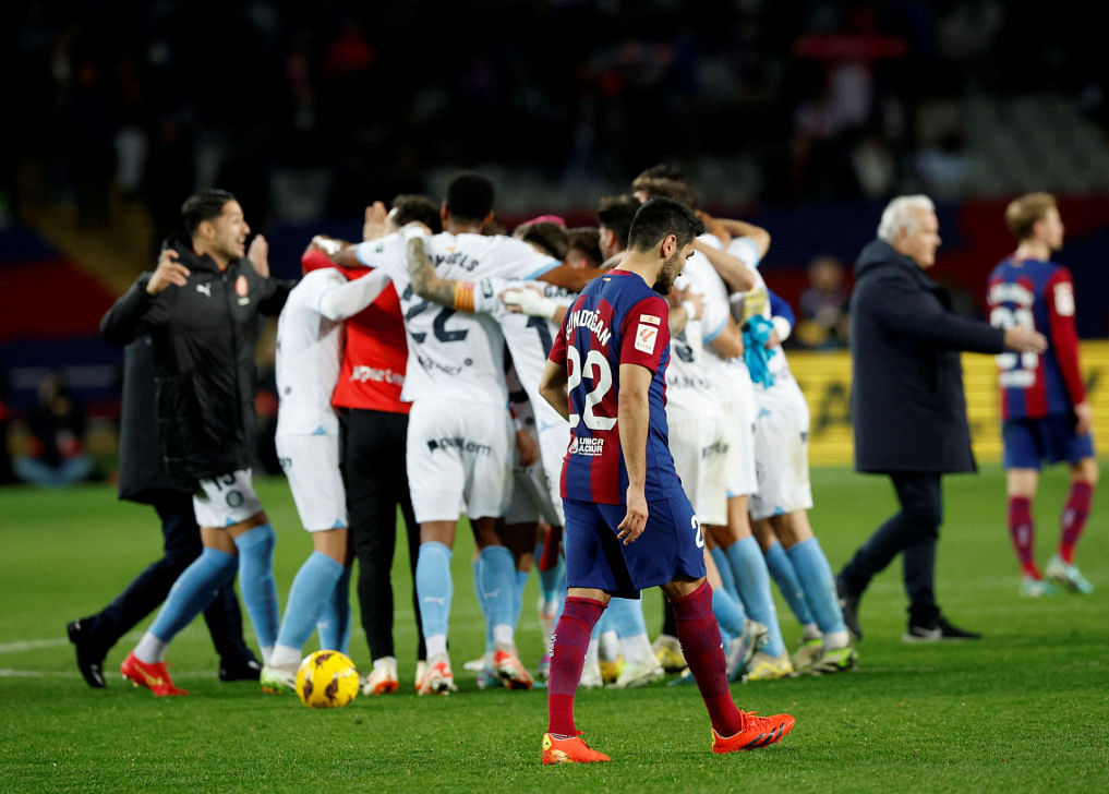 Superb girona stun barca to lead la liga0